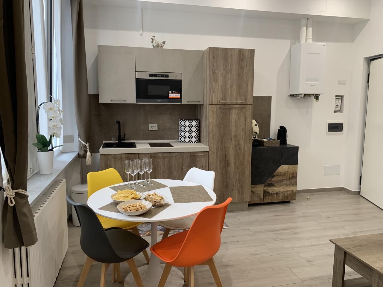 Zona living luminosa dell'appartamento Ripa 150 in Via Ripamonti